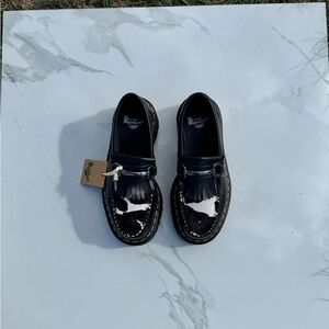 SOLD 

Dr.  Doc Martin ADRIAN SNAFFLE HAIR ON & LEATHER COW PRINT KILTIE LOAFERS